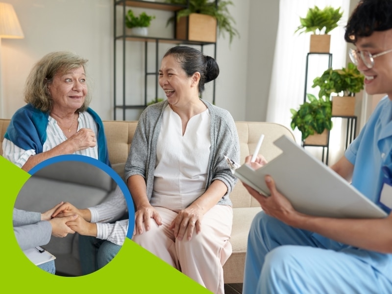 a professional with two women happily talking indicating a good daily living support